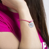 Różowa bransoletka z zawieszką JUMPit + woreczek