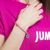 Czarna bransoletka z zawieszką JUMPit + woreczek